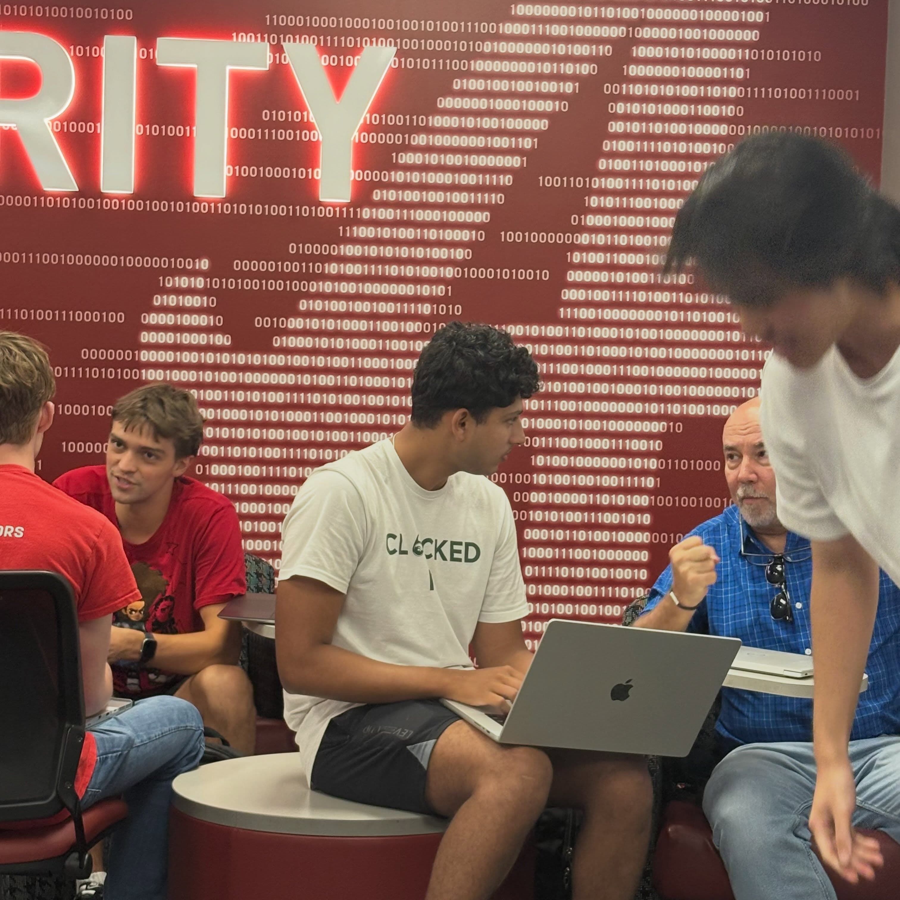 Talking through ideas at a HackBama workshop.